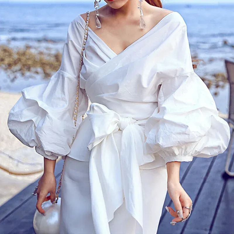 Damen Wickelbluse mit voluminösen Ärmeln – Élovi