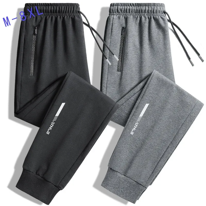 Herren Slim-Fit Performance-Jogginghose mit Reißverschlusstaschen, elastischem Bund und Bündchen Echoarchiv