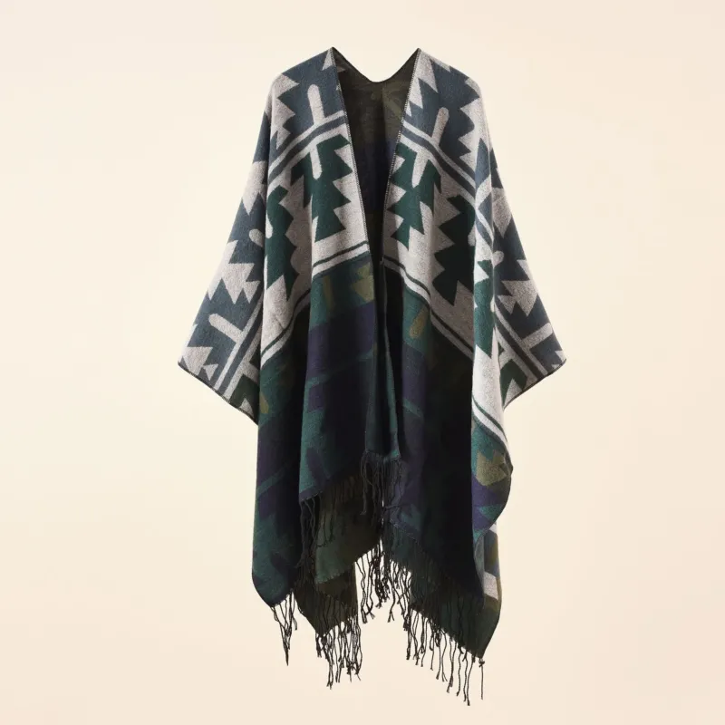Damen Oversize-Ruana mit V‑Ausschnitt, grobem Jacquardmuster und langen Fransen – Avérine